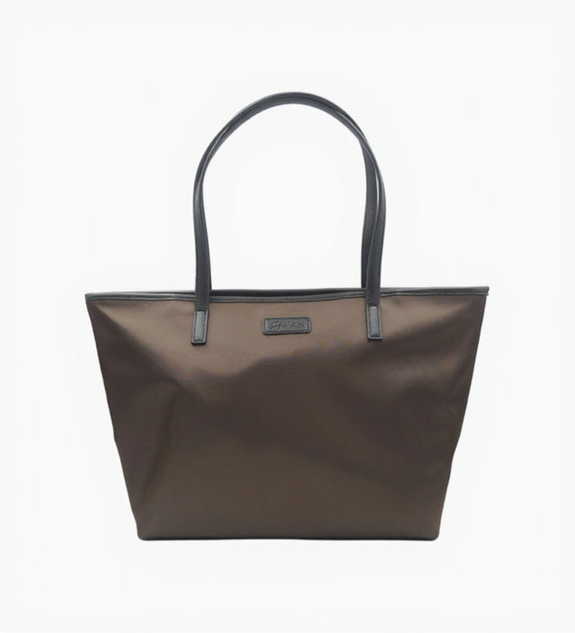 Brown tote bag with a visible brand logo on a white background